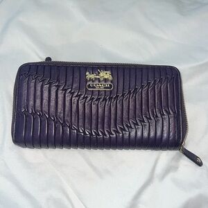 Authentic Coach leather accordion purple wallet gently used